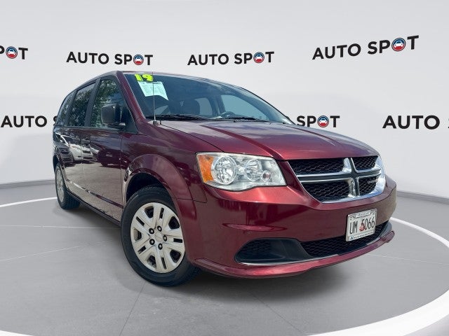 2019 Dodge Grand Caravan SE in Red — front three-quarter view