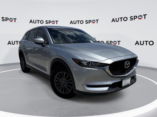 2019 Mazda Mazda CX-5 Sport in Silver — front three-quarter view