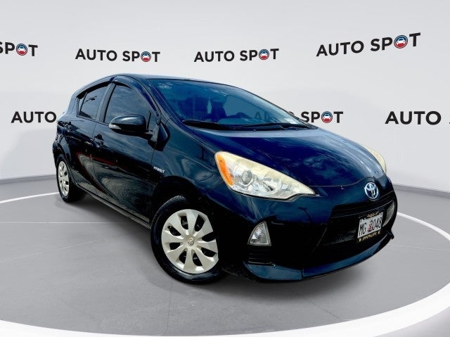 2014 Toyota Prius c One in Black — front three-quarter view